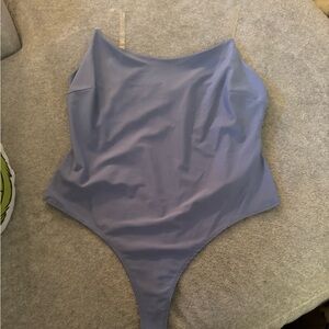 Blue spandex body suit